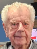 E.